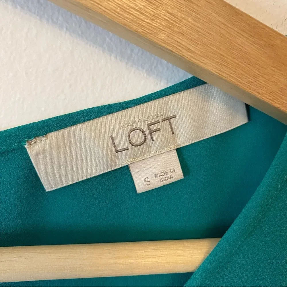 Ann Taylor Loft green jewel toned blouse with cut out detail size S.
